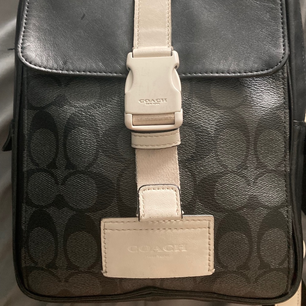 Men’s signature coach crossbody bag.